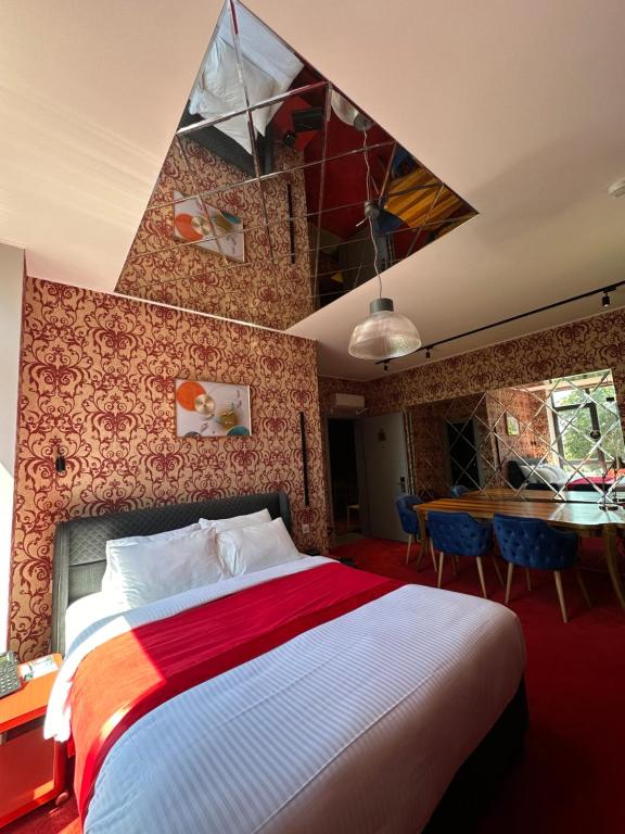Postel nebo postele na pokoji v ubytování 10inn Boutique Hotel