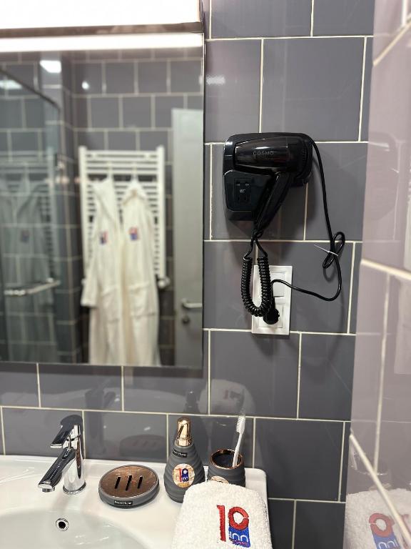 Koupelna v ubytování 10inn Boutique Hotel