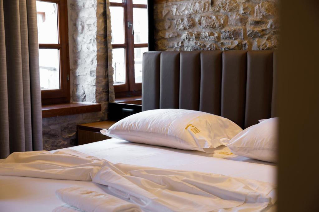 Postel nebo postele na pokoji v ubytování Furra Hotel