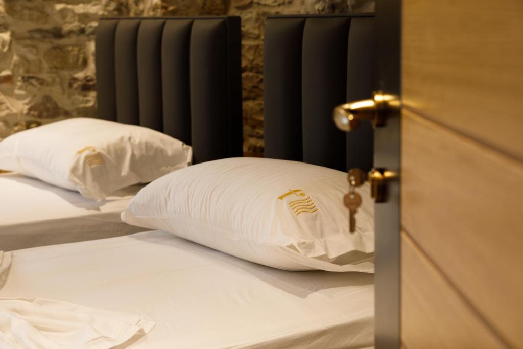 Postel nebo postele na pokoji v ubytování Furra Hotel