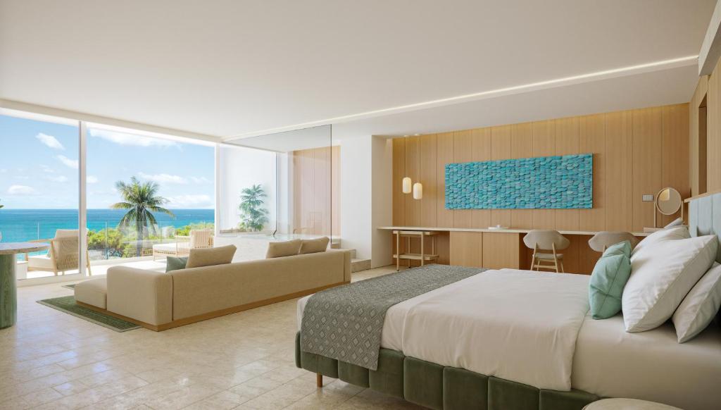 Posezení v ubytování JOIA Aruba by Iberostar