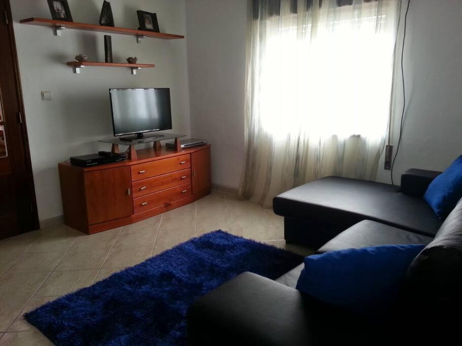 TV a/nebo společenská místnost v ubytování Casa Brisa do Mar
