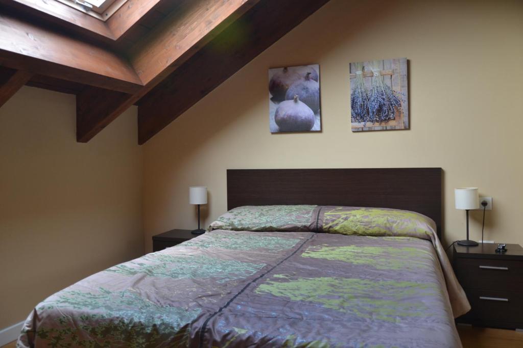A bed or beds in a room at La Massana