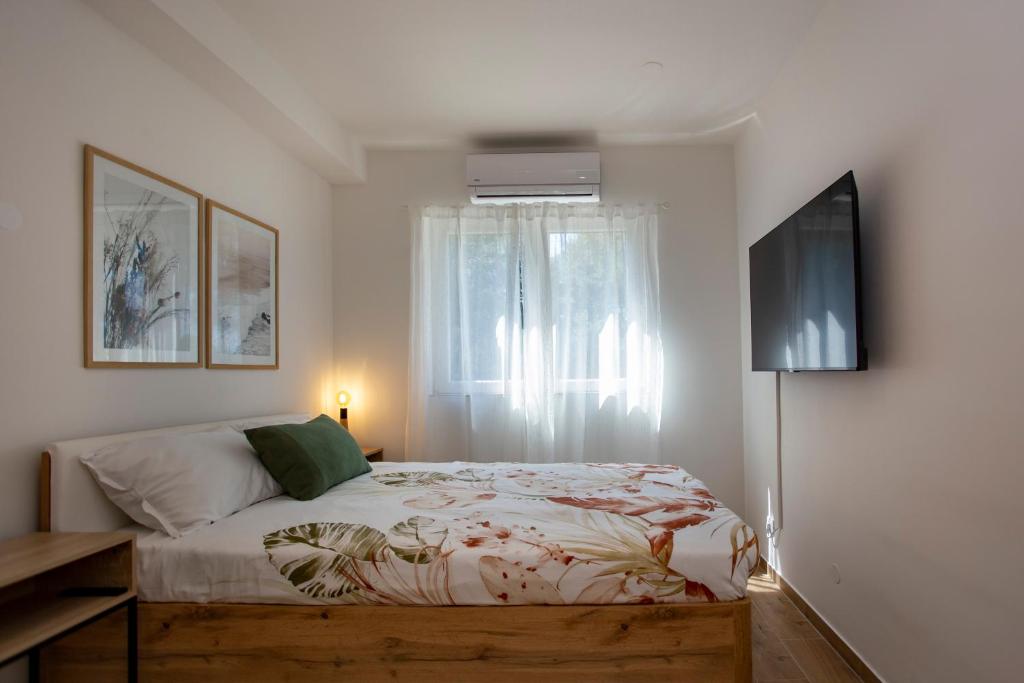 Ένα ή περισσότερα κρεβάτια σε δωμάτιο στο Room Levi