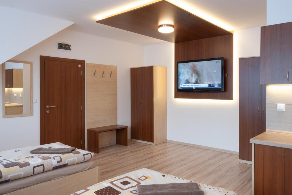 Postel nebo postele na pokoji v ubytování SISI Pension