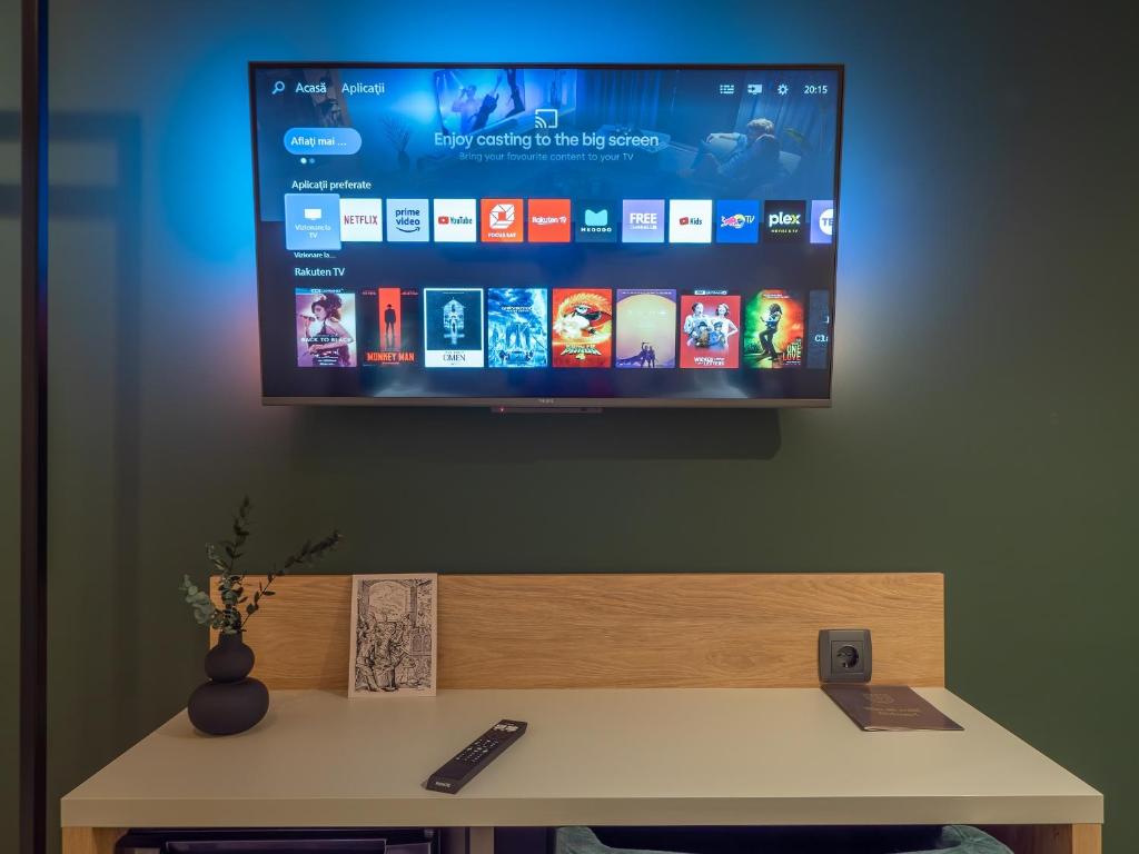 Una televisión o centro de entretenimiento en Craft Inn - Boutique Hotel