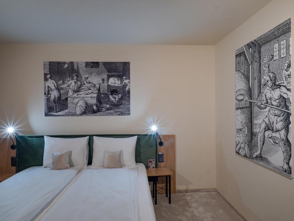 Una cama o camas en una habitación de Craft Inn - Boutique Hotel