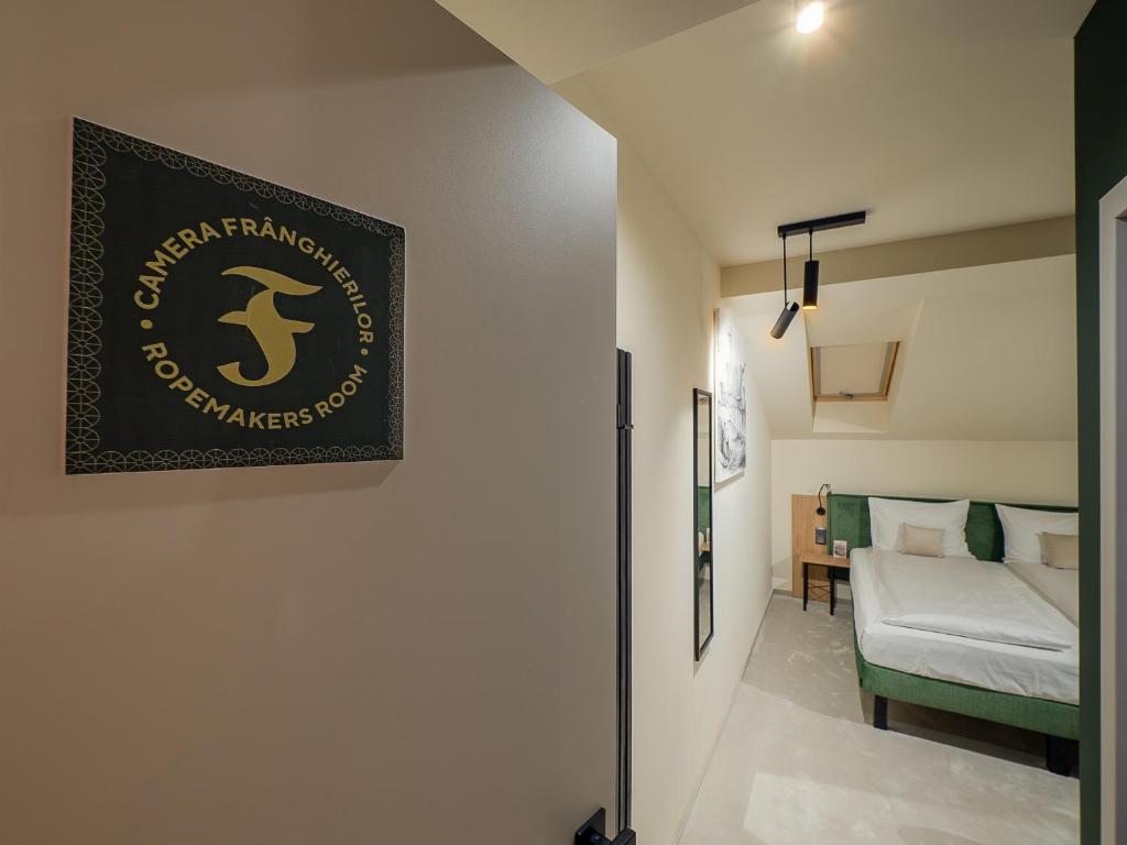Una cama o camas en una habitación de Craft Inn - Boutique Hotel