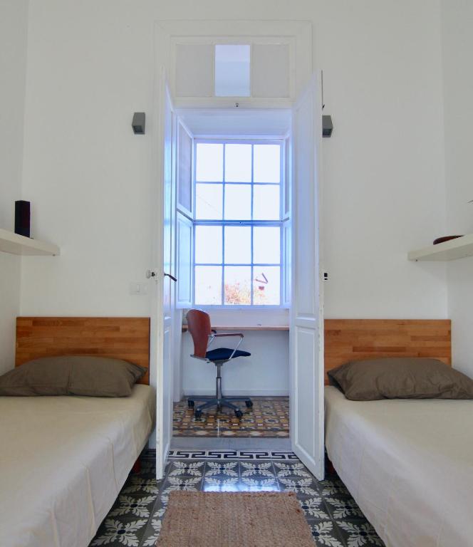 Postel nebo postele na pokoji v ubytování Casa La Breña La Palma