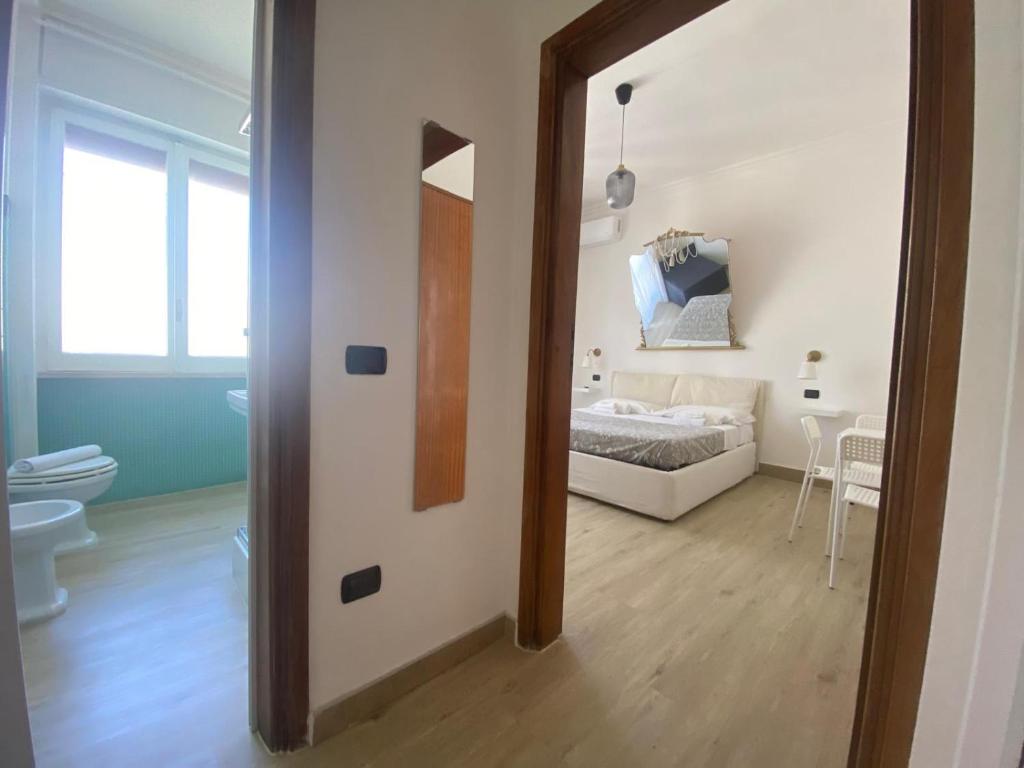 Postel nebo postele na pokoji v ubytování B&B 10 mt dal duomo