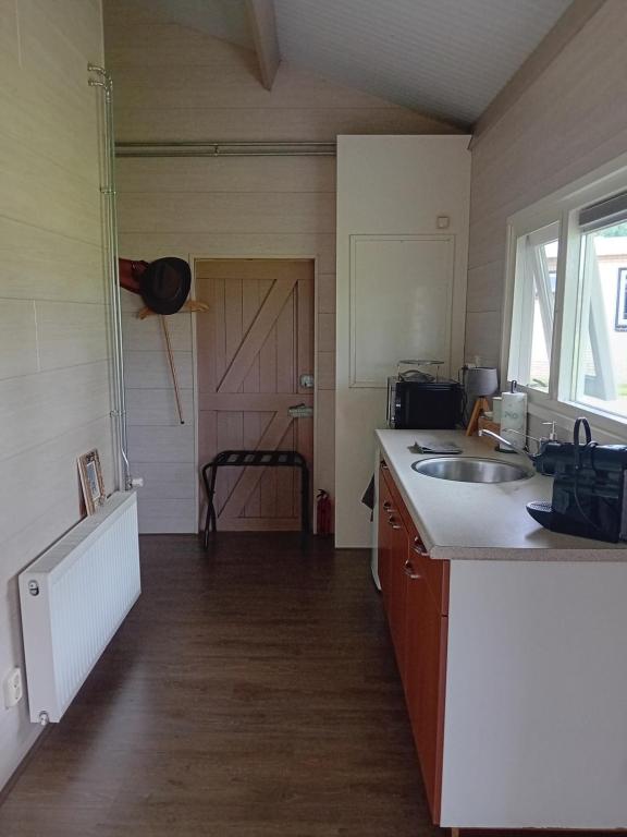Kuchyň nebo kuchyňský kout v ubytování B&B Stripsein