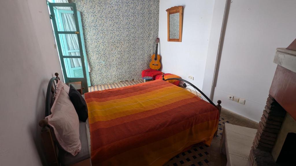 Postel nebo postele na pokoji v ubytování Riad Dar