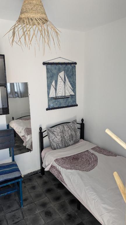 Postel nebo postele na pokoji v ubytování Riad Dar