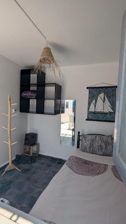 Postel nebo postele na pokoji v ubytování Riad Dar