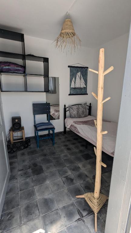 Postel nebo postele na pokoji v ubytování Riad Dar