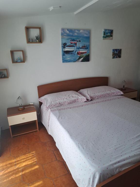 Postel nebo postele na pokoji v ubytování Appartamento Marina di Pisticci-Marconia