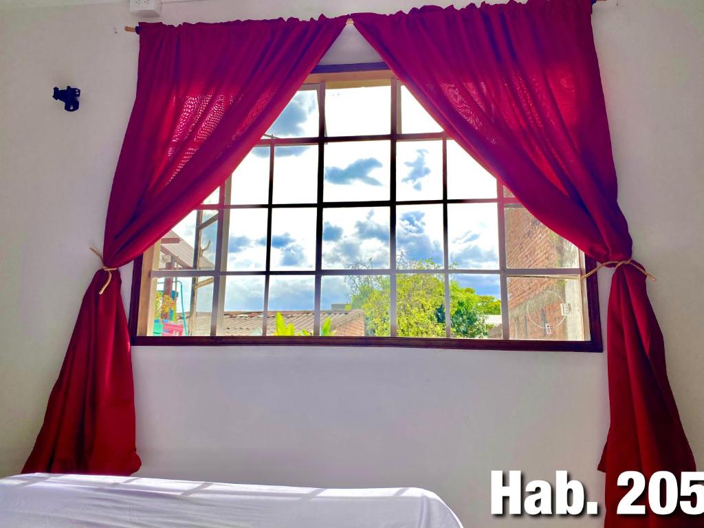 Postel nebo postele na pokoji v ubytování Ding-Dong Hostel
