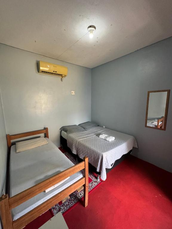 Postel nebo postele na pokoji v ubytování Discovery Hostel