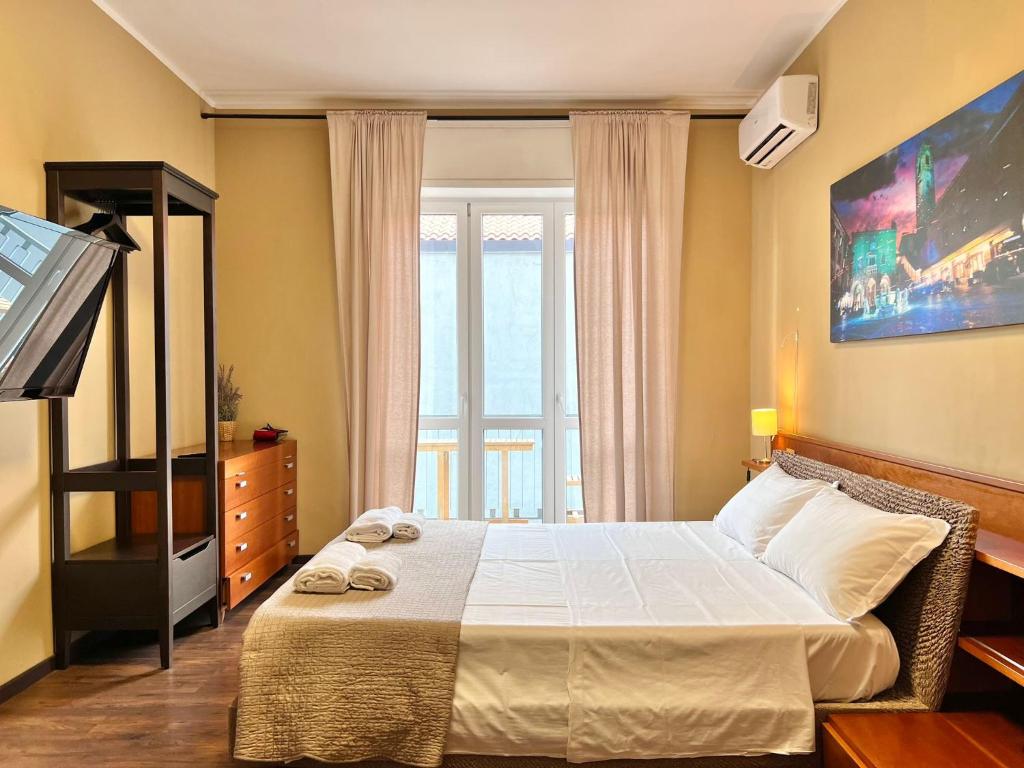 Postel nebo postele na pokoji v ubytování Bergamoincity