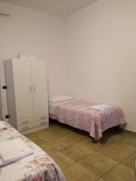 Postel nebo postele na pokoji v ubytování B&B in family Gabriele