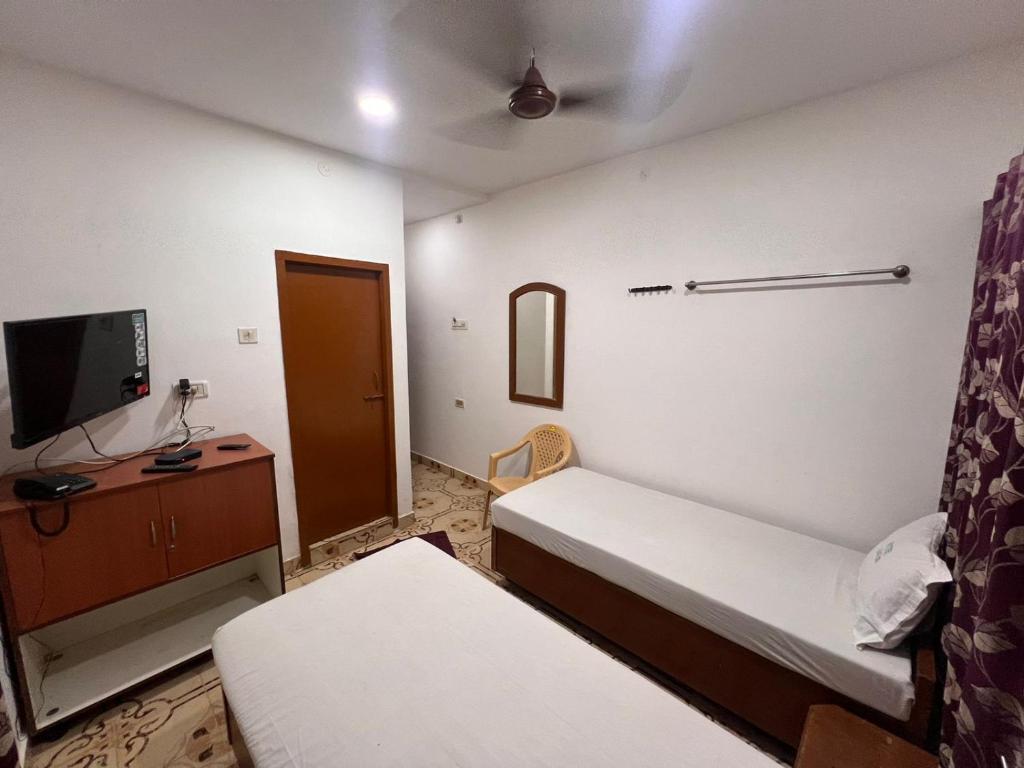 Postel nebo postele na pokoji v ubytování Hotel Safra
