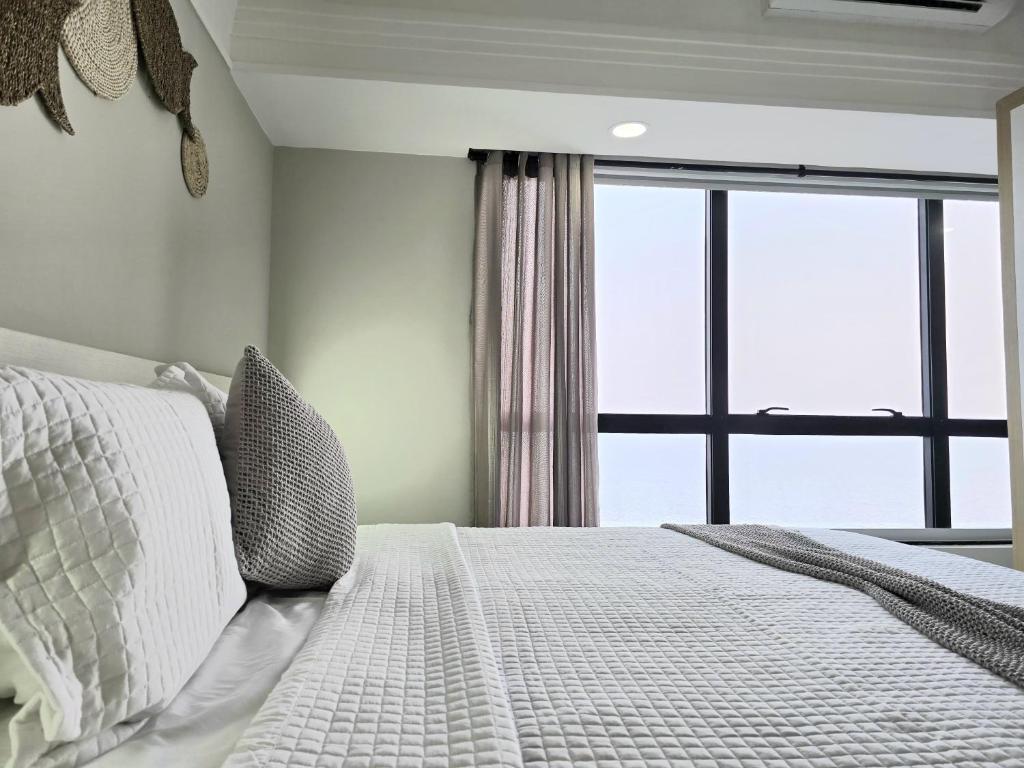 Postel nebo postele na pokoji v ubytování 1313 Flat de Luxo com vista maravilhosa do Rio