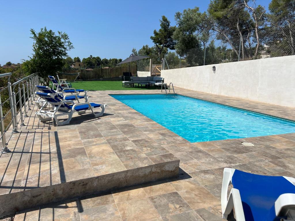 Bazén v ubytování Maison de Rêve avec Piscine Privative et Vue sur Mer - Proche Barcelone et Port Aventura nebo v jeho okolí