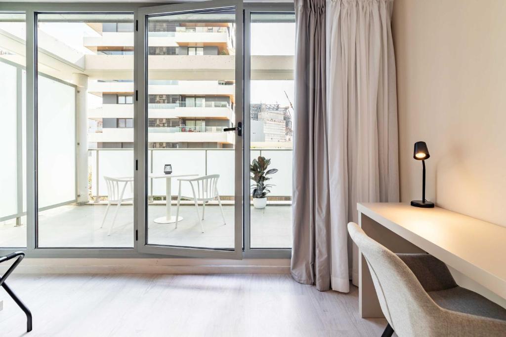 Balkón nebo terasa v ubytování HQ Arena Hotel