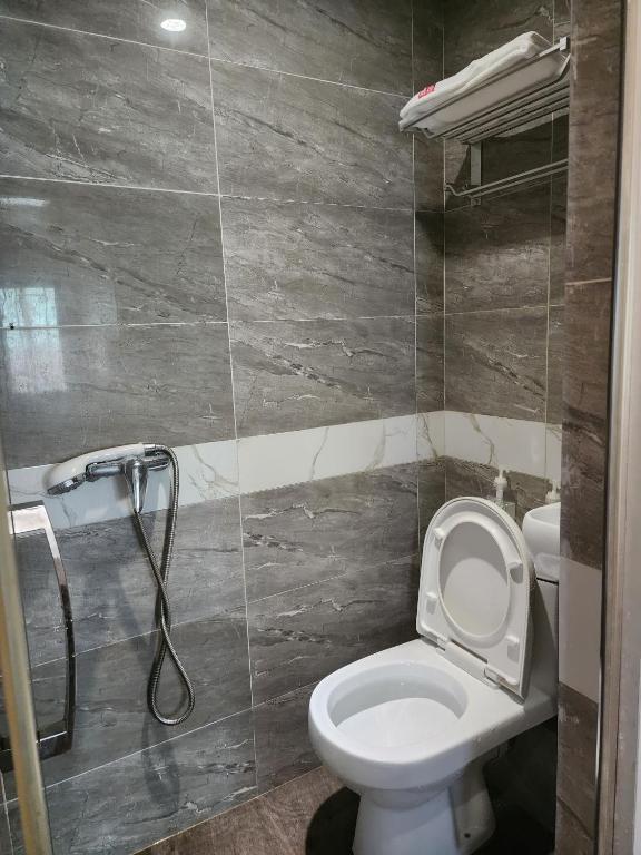 Vannituba majutusasutuses 香港金門賓館 KamMun Guest House