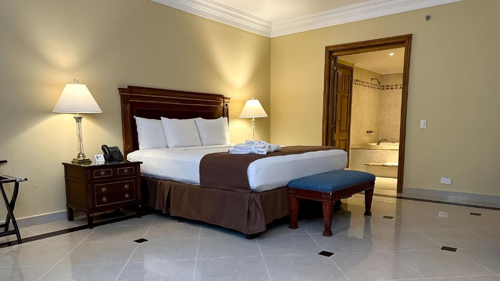Uma cama ou camas num quarto em Hotel El Prado