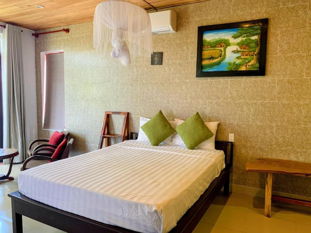 Postel nebo postele na pokoji v ubytování Homestay Ocbien
