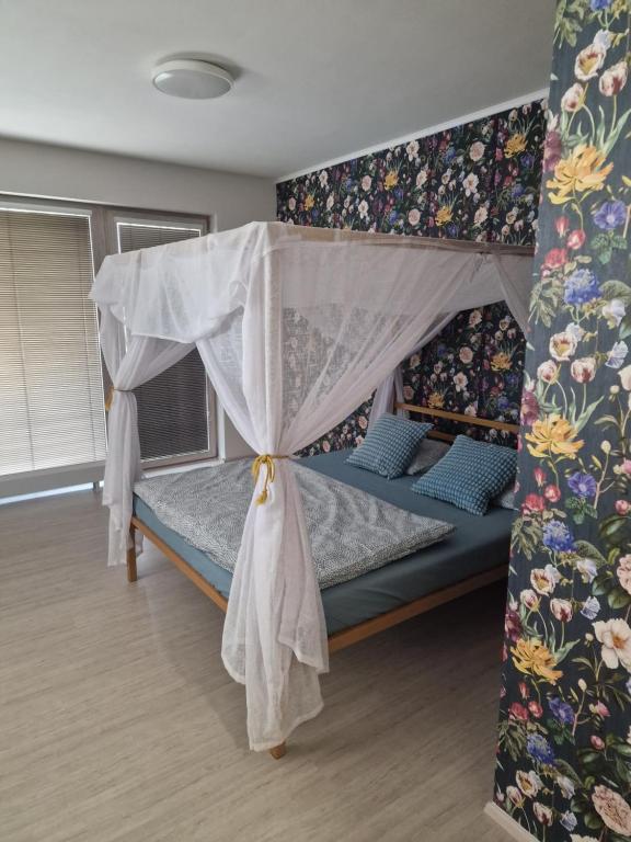 Postel nebo postele na pokoji v ubytování GLAM apartmán Bučovice