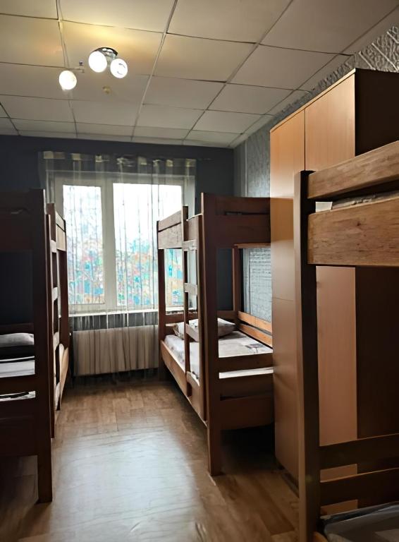 Postel nebo postele na pokoji v ubytování Welcome 24 Mukachevo