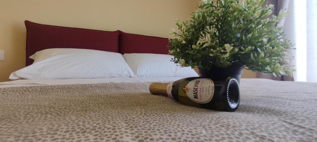 Postel nebo postele na pokoji v ubytování FeVi Rooms