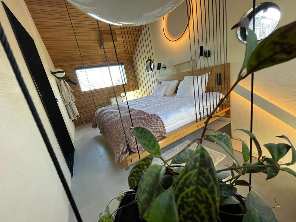 Postel nebo postele na pokoji v ubytování vondice hotel