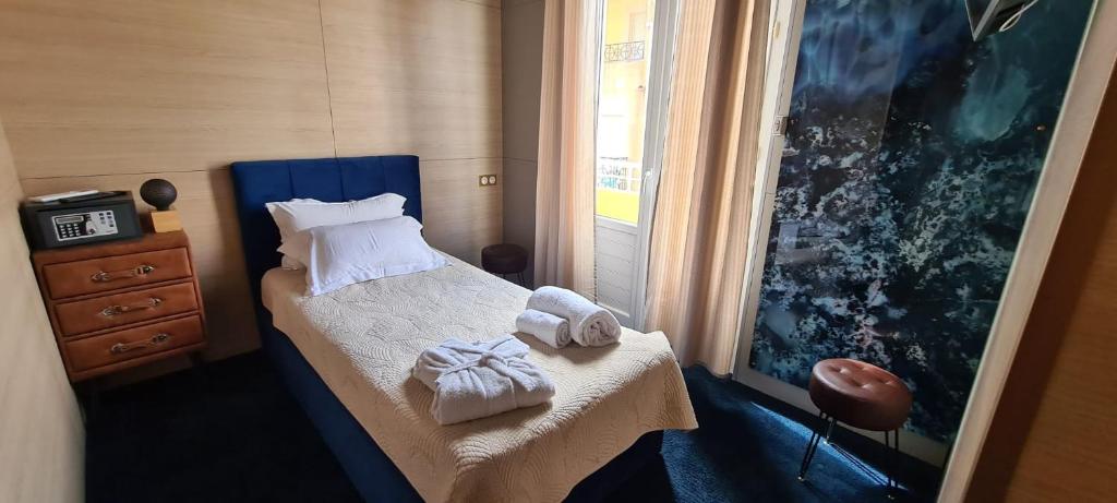 Postel nebo postele na pokoji v ubytování Hôtel les 4 éléments