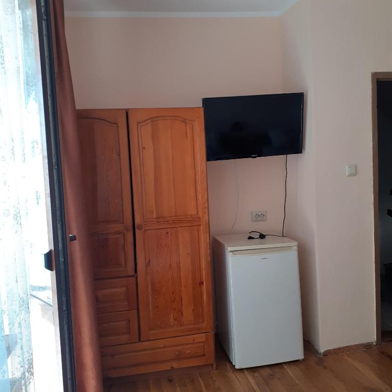 TV a/nebo společenská místnost v ubytování Guest House Sun