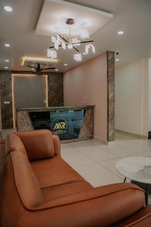 Posezení v ubytování Makkiyil Residency