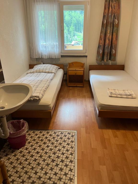 Voodi või voodid majutusasutuse Holiday House Lärchenheim toas