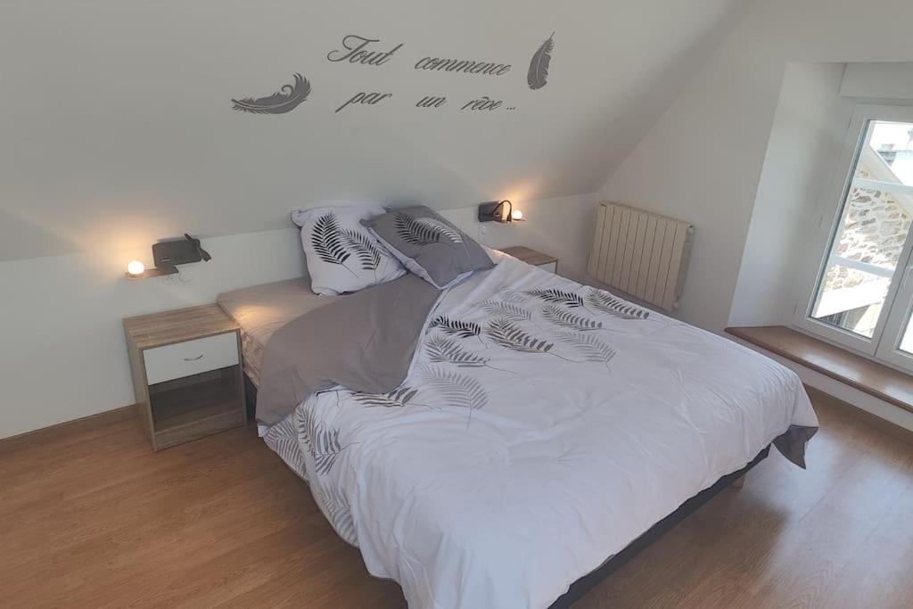 Postel nebo postele na pokoji v ubytování Gîte fleur du paradis