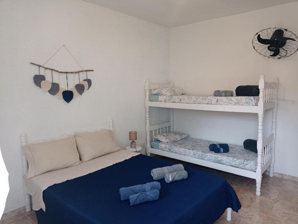 Postel nebo postele na pokoji v ubytování Quinta essência suites