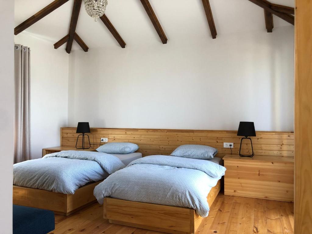 Postel nebo postele na pokoji v ubytování Lokokina Guesthouse