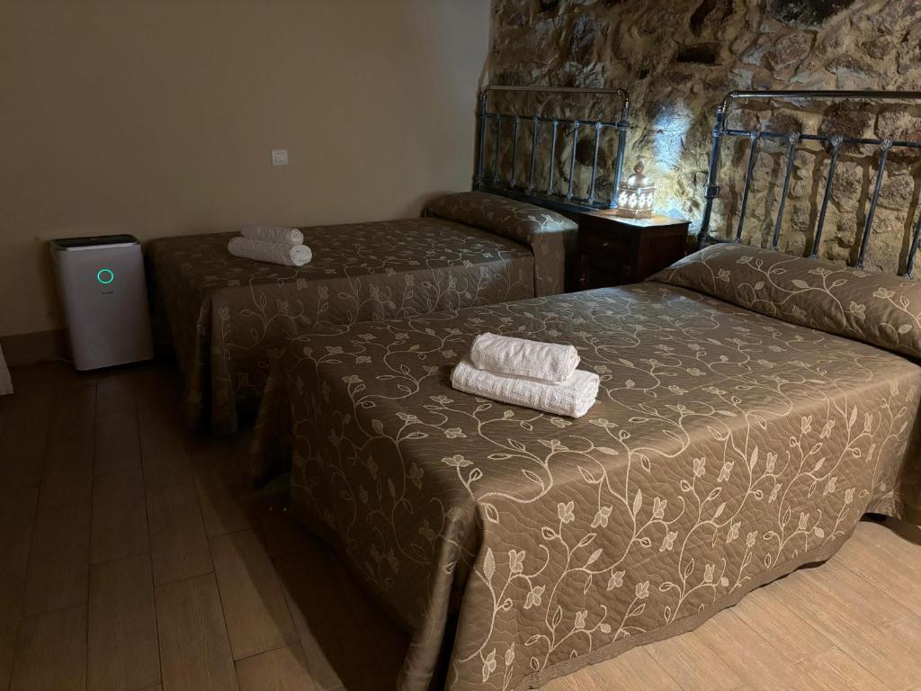 Postel nebo postele na pokoji v ubytování Casa Rural La Barquilla