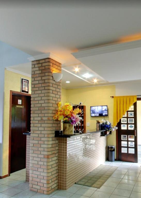 TV a/nebo společenská místnost v ubytování Hotel Xapuri
