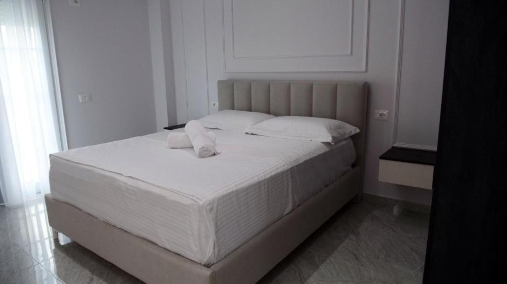 Postel nebo postele na pokoji v ubytování Bar Restorant Hotel Rama