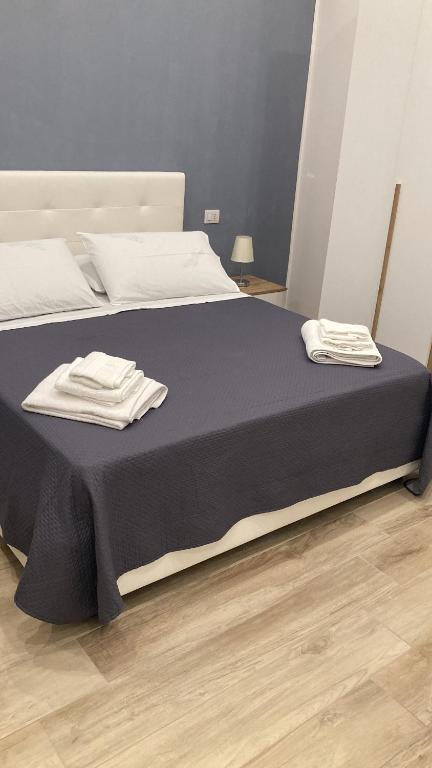 Ένα ή περισσότερα κρεβάτια σε δωμάτιο στο GoldenHouse