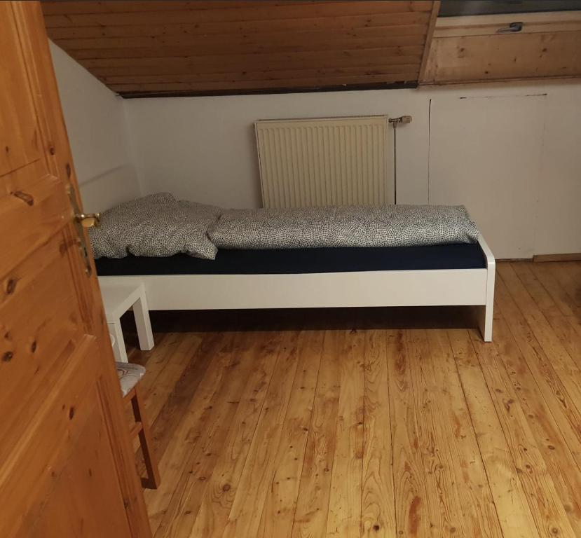 Postel nebo postele na pokoji v ubytování L8 Ferienwohnung - Stuttgart Renningen