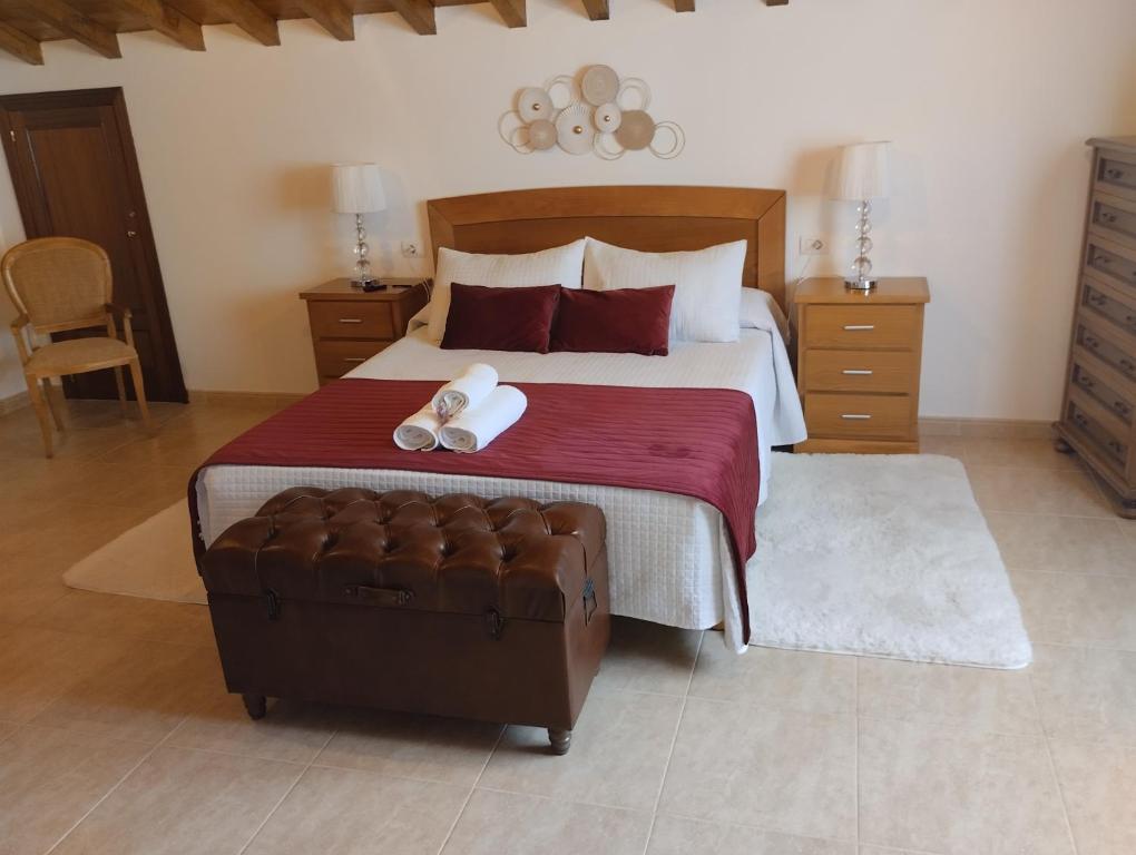 A bed or beds in a room at Casa Xarreiro