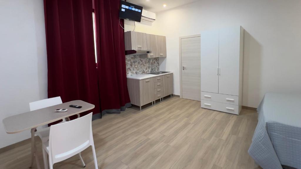 Kuchyň nebo kuchyňský kout v ubytování La Casa Di Federico II