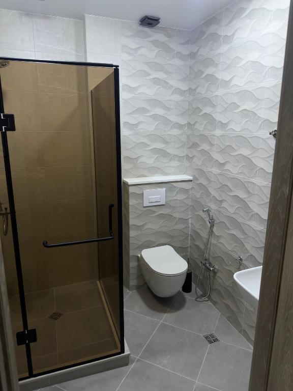 Koupelna v ubytování RUMI Hotel